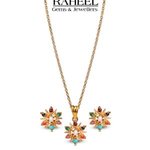 Elegant floral jewelry set with colorful gemstones, featuring earrings and a pendant in a gold setting by Raheel Gems & Jewellers.