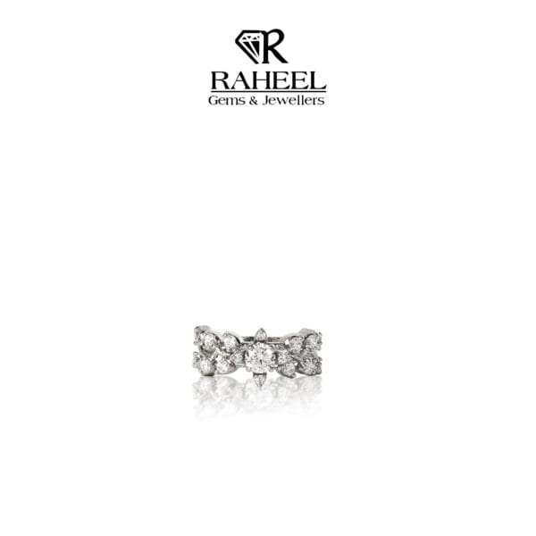 Beautiful zircon ring from Raheel Gems & Jewellers with a close-up front view showcasing sparkling stones in a silver setting.