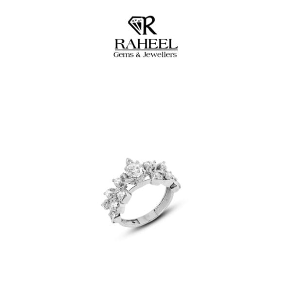 Elegant zircon ring from Raheel Gems & Jewellers featuring a cluster of dazzling stones in a sleek silver band, side angle.