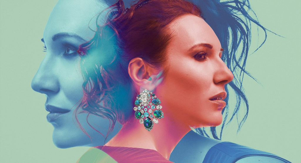 a women with a large stone earring