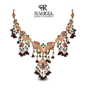 Traditional silver Navratna bridal necklace with multi-colored gemstones and pearls handcrafted in Karachi.